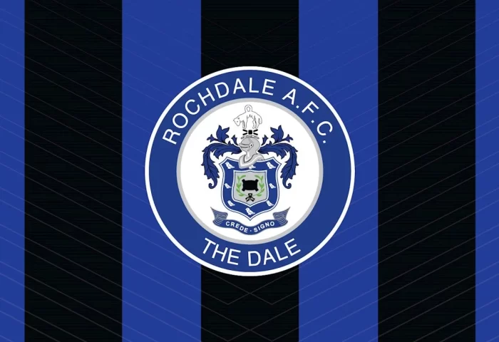 Rochdale AFC's crest on a blue and black vertical striped background