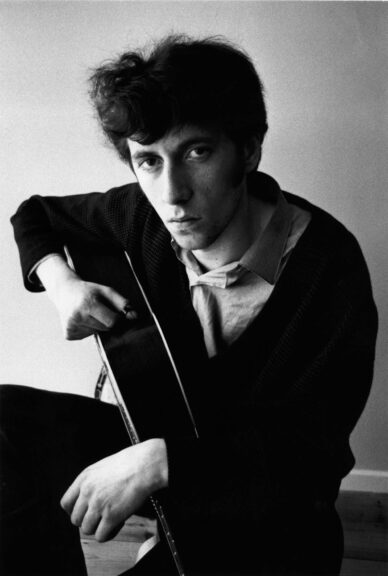 Black and white photograph of folk singer Bert Jansch by Brian Shuel, from the artists debut album cover