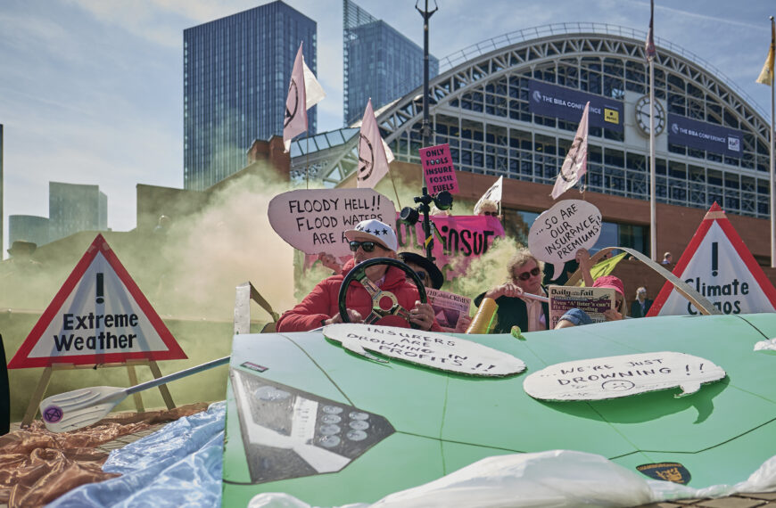Insurance industry conference in Manchester draws protest against fossil fuels